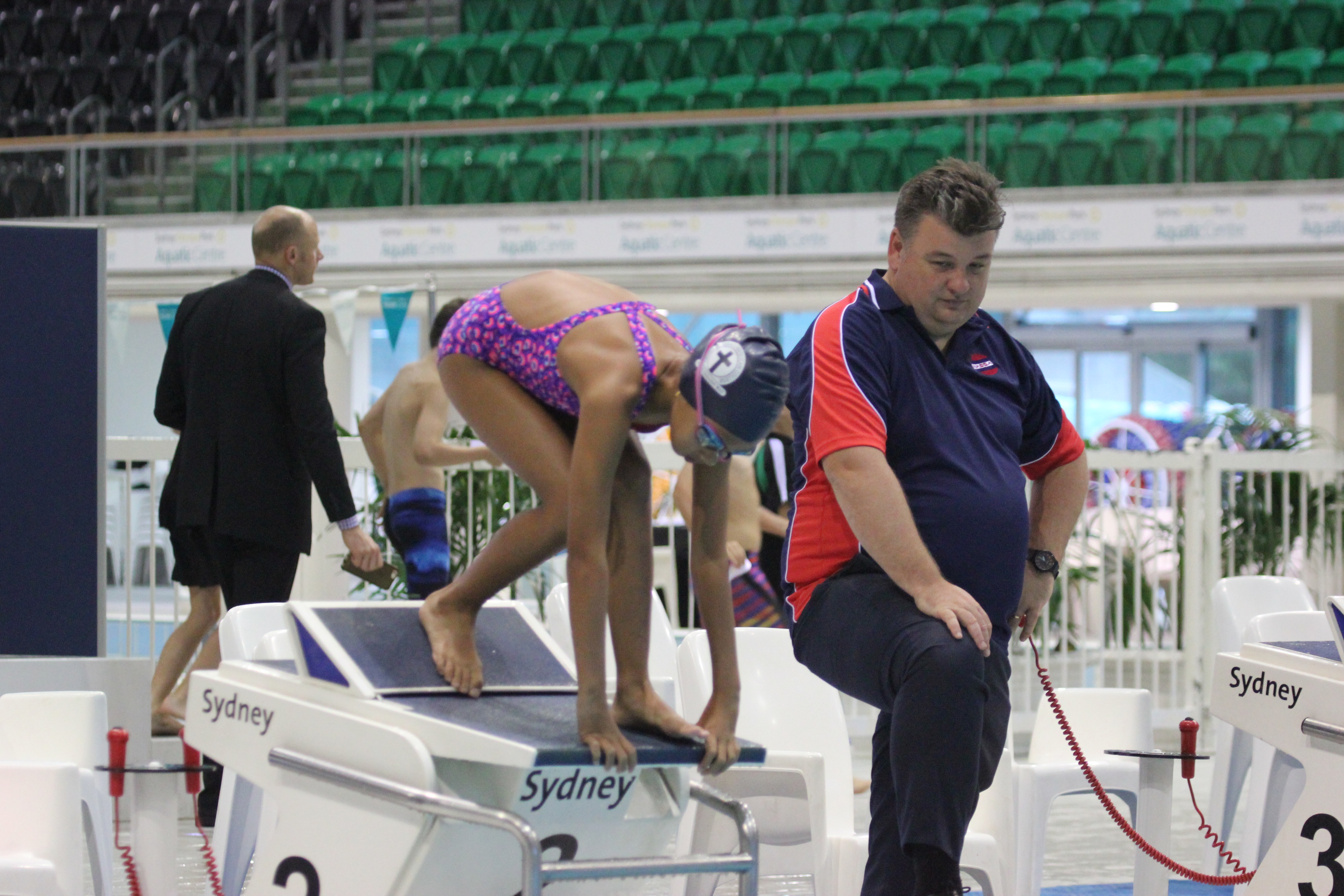 girl swimming diving relay