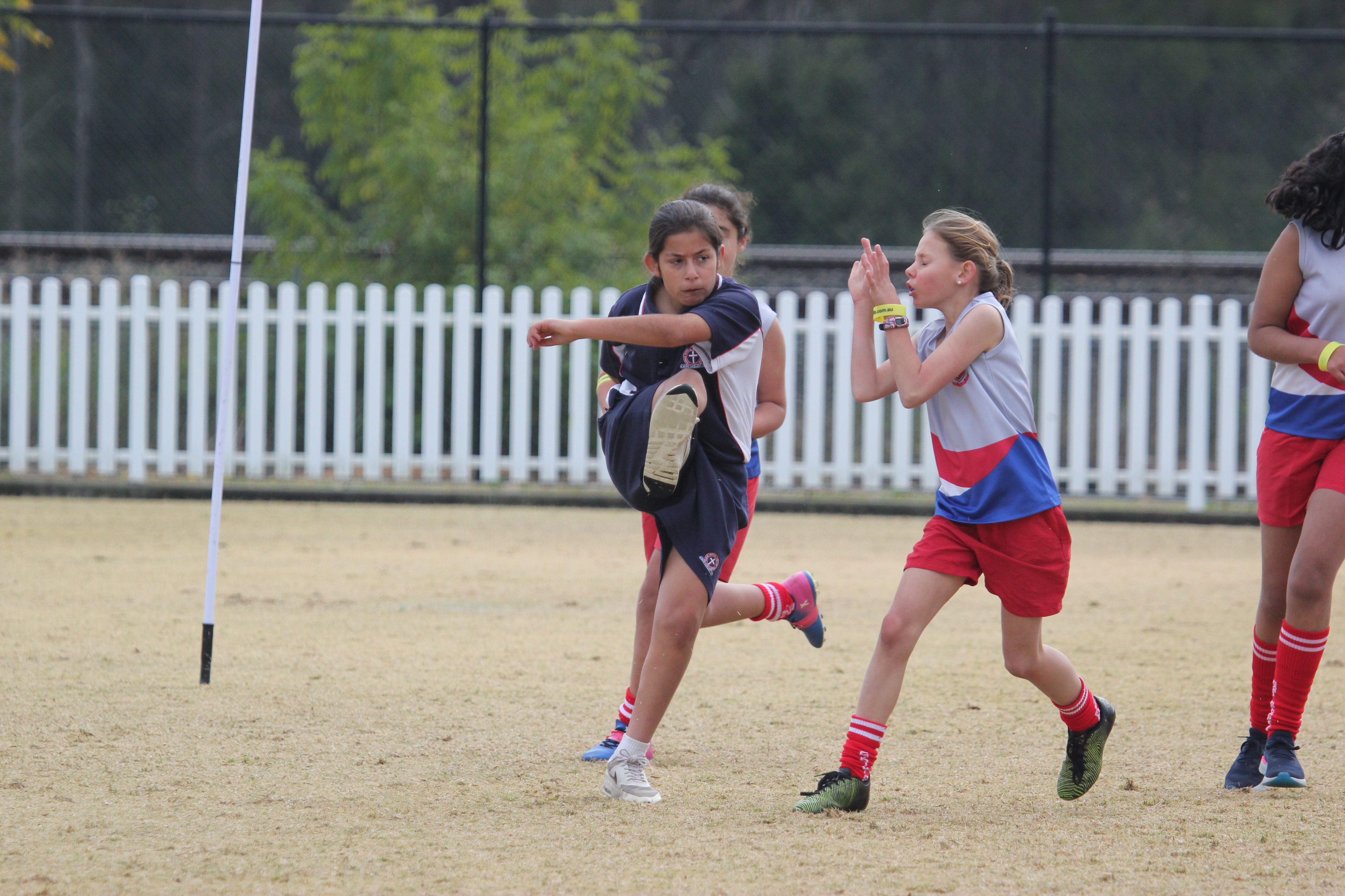 Paul Kelly Cup AFL kicking football