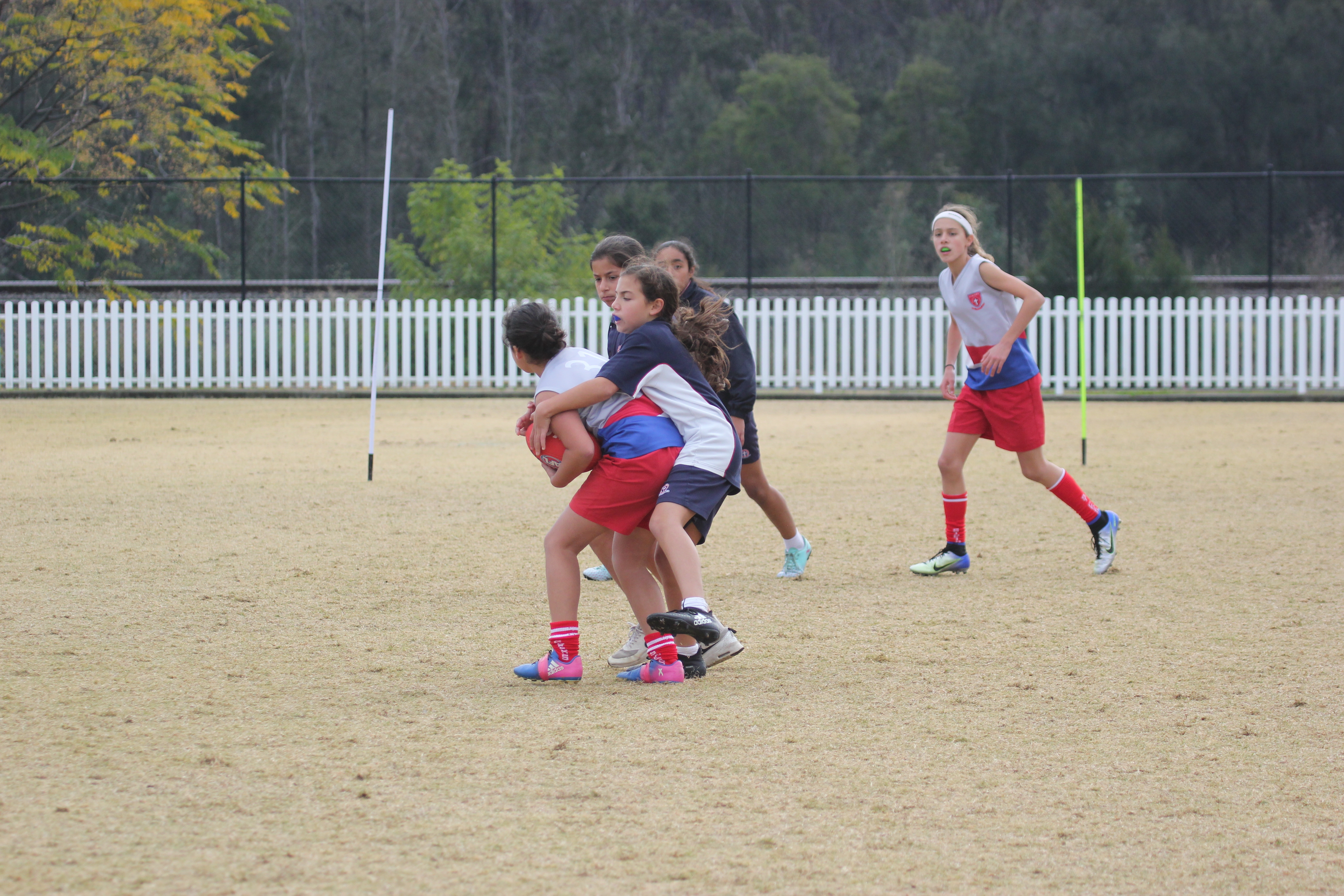 Paul Kelly Cup AFL kicking football