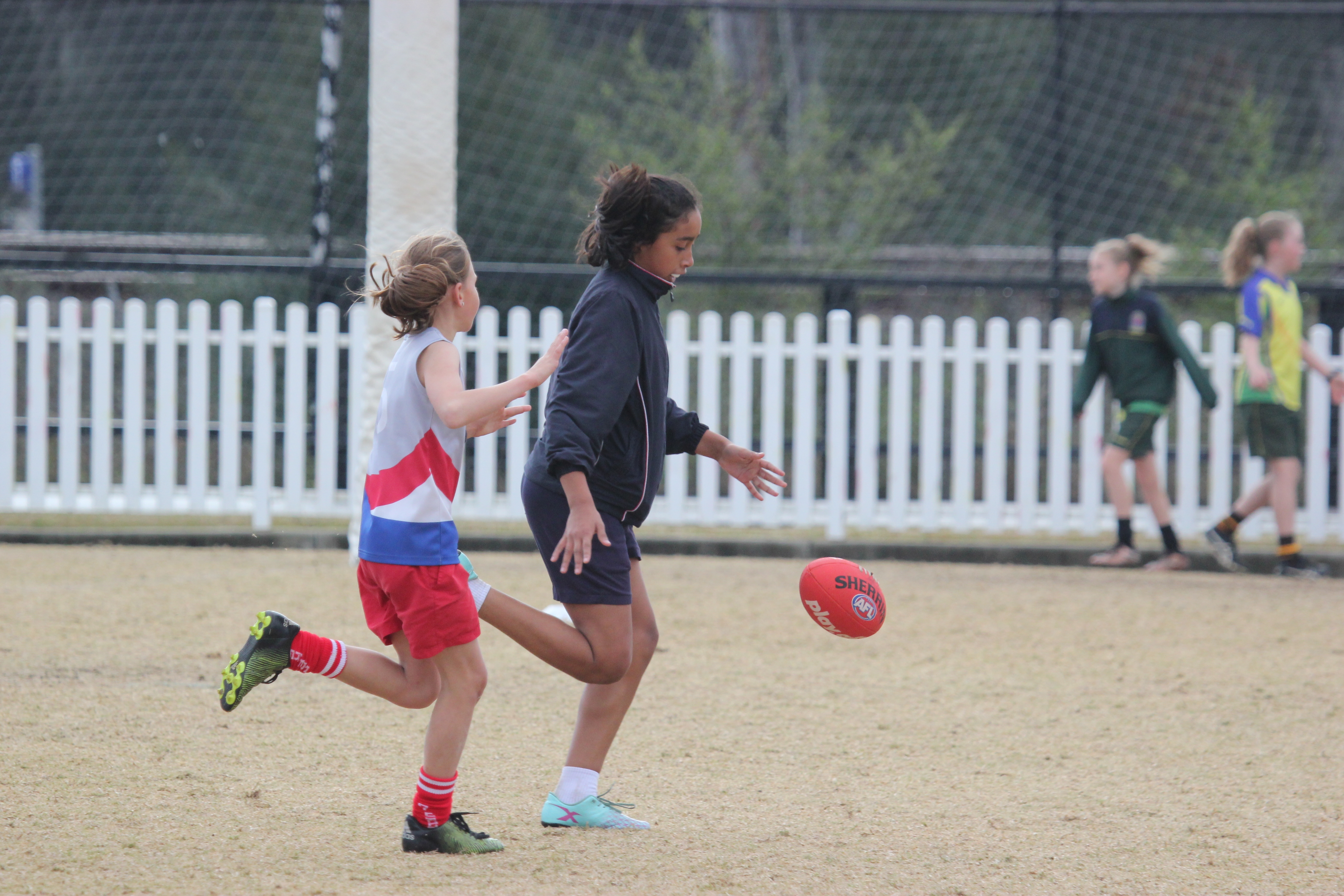 Paul Kelly Cup AFL kicking football