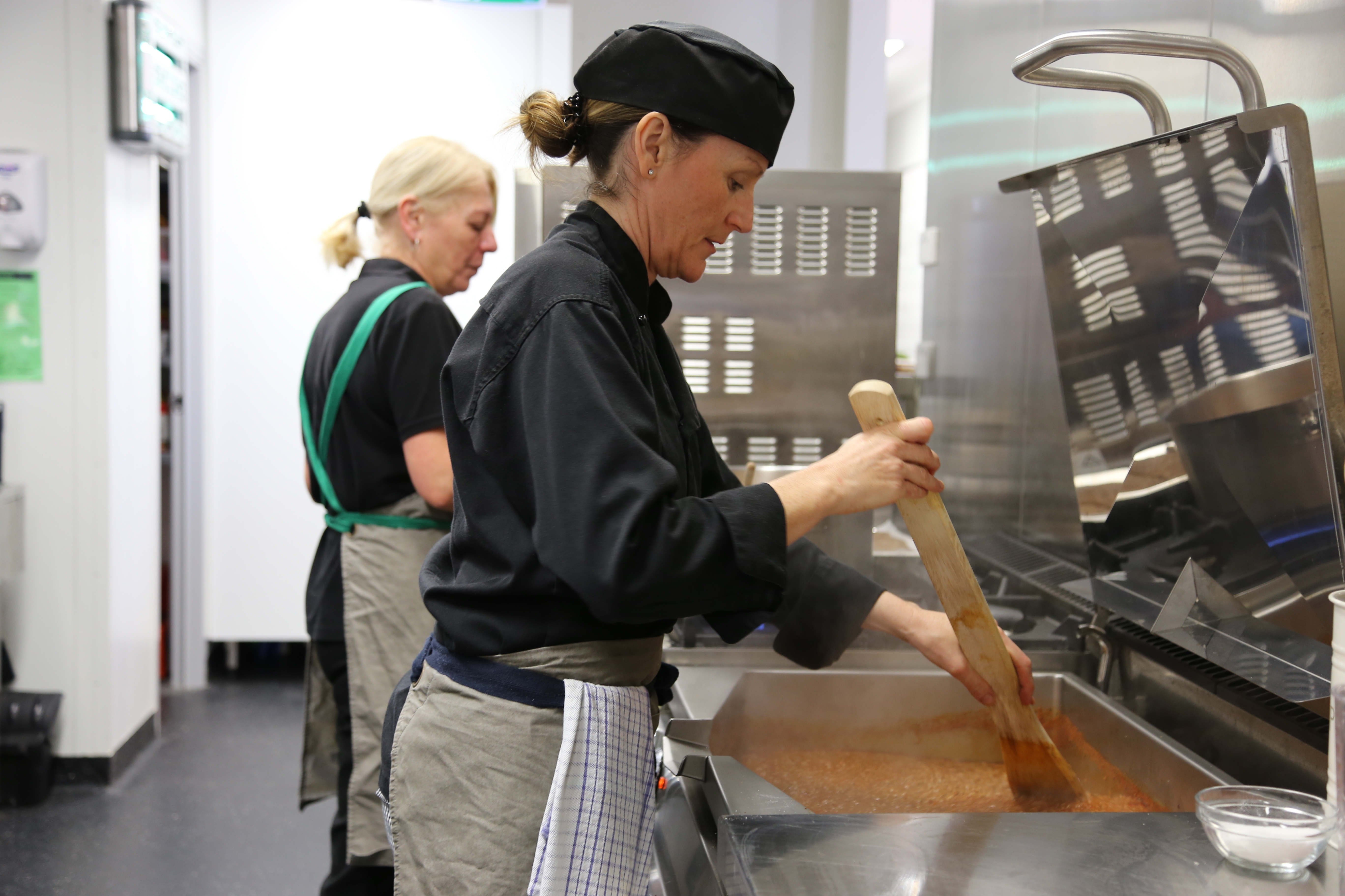 Mrs Riitano's Kitchen cooking lasagna bolognese staff