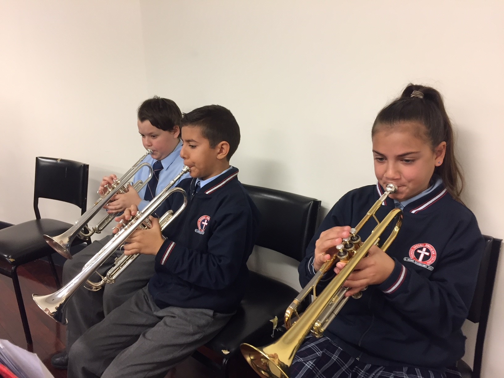 Essentially Ellington Intermediate Stage Band trumpets