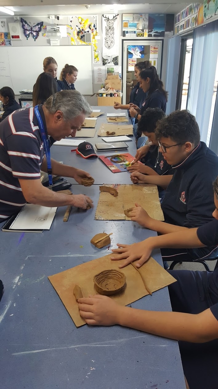 Year 8 Boys doing clay work