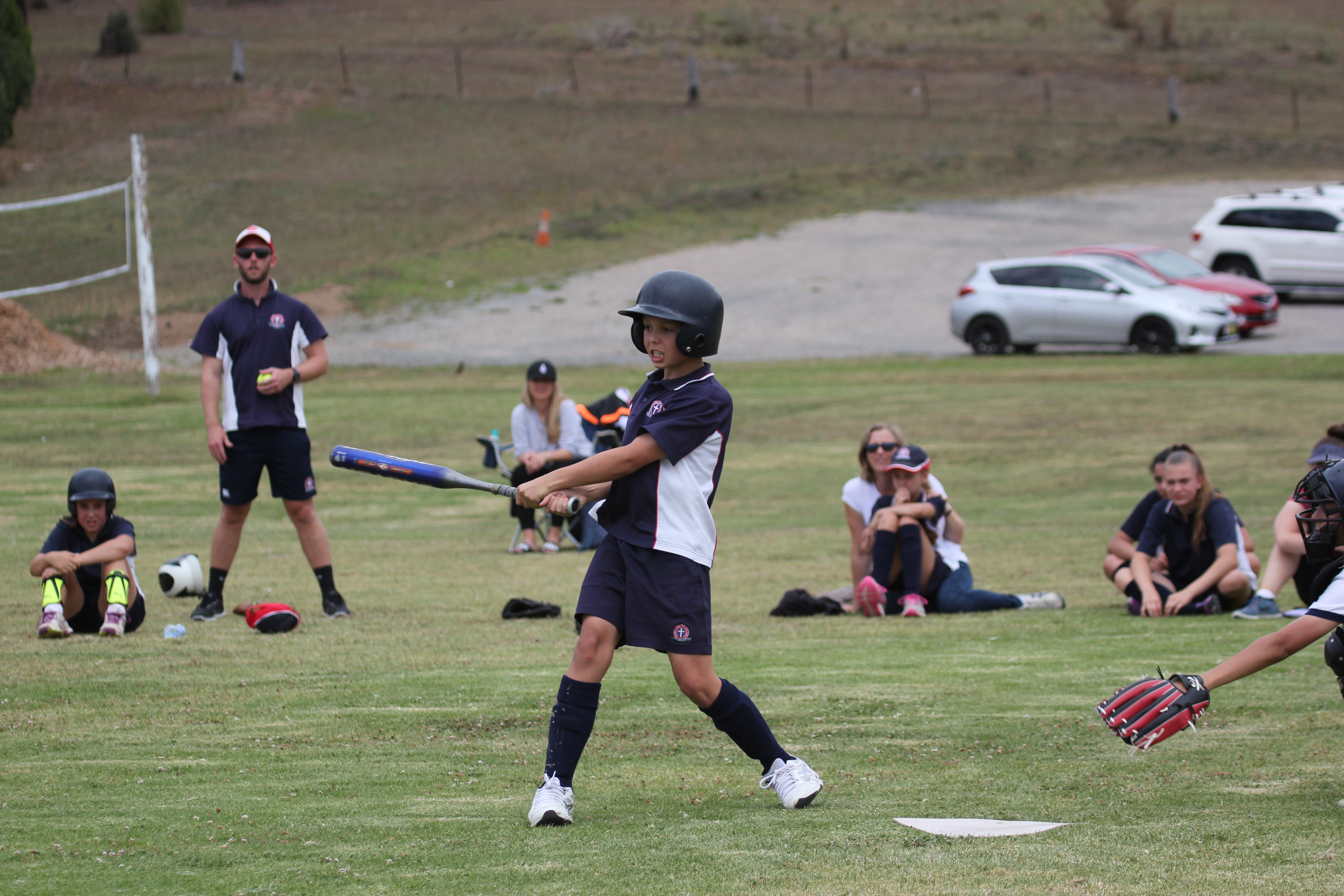 batter softball swing