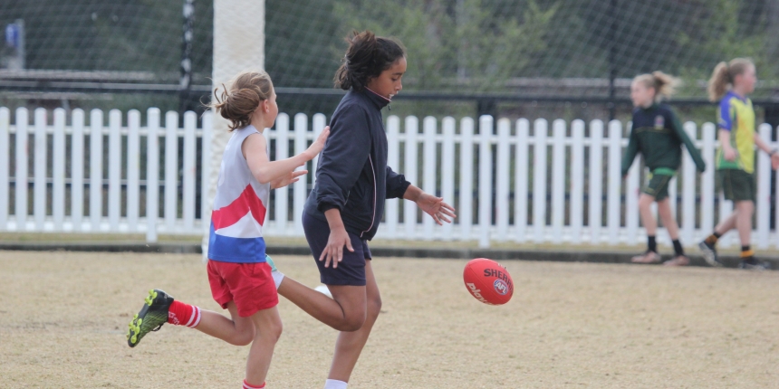 Paul Kelly Cup AFL kicking football