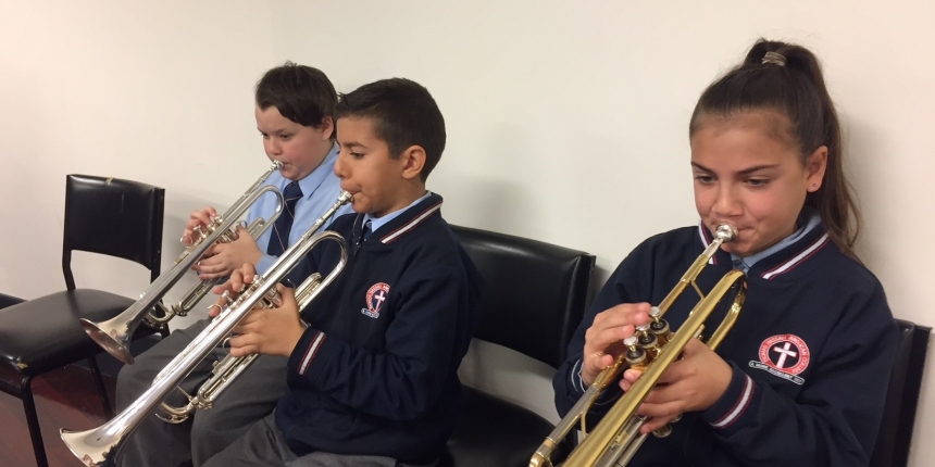 Essentially Ellington Intermediate Stage Band trumpets