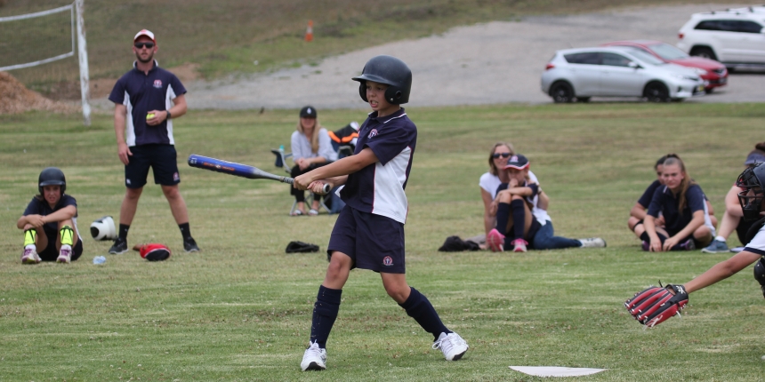 batter softball swing